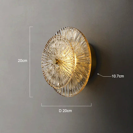 Schéma de cotes de l'applique en verre strié doré, diamètre 20 cm et saillie 10,7 cm