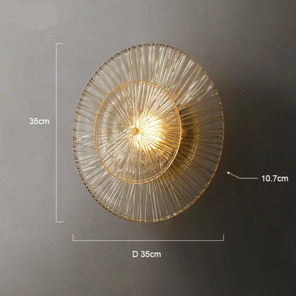 Schéma de cotes de l'applique en verre strié doré, diamètre 35 cm et saillie 10,7 cm