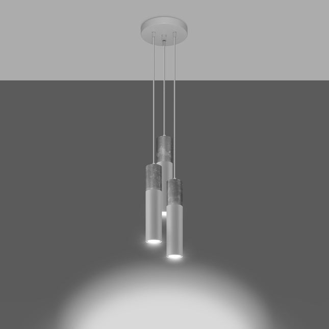 Suspension Colonne 3P blanche allumée, lumière diffusée par les trois tubes en béton et acier