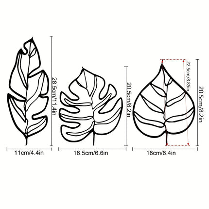 Schéma des dimensions des trois feuilles en métal : plume 11 x 28,5 cm, monstera 16,5 x 20,5 cm, feuille cœur 16 x 20,5 cm