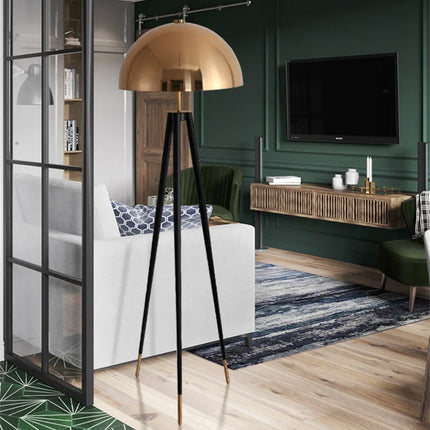 Éclairage chaleureux avec lampadaire style nordique sur pied tripode.