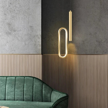Double suspension LED nordique minimaliste au-dessus d'un chevet