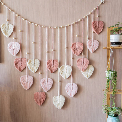 Décoration à feuilles en macramé coloris rose de style bohème