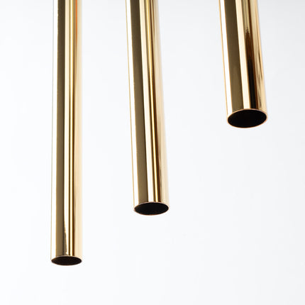 Détail des trois embouts en acier or poli de la suspension Halo 3L, finition brillante