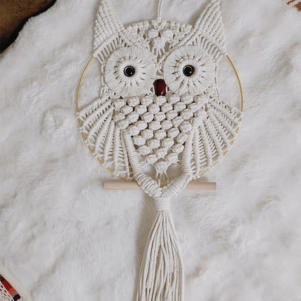 Hibou en macramé bohème décorant une chambre à l'esprit nature