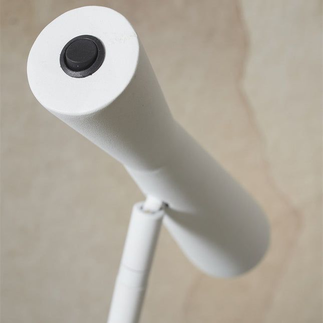 Détail de la tête orientable et du bouton de réglage du lampadaire Bordeaux blanc