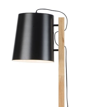 Lampadaire bibliothèque Cambridge près d'un canapé avec coussin à pois