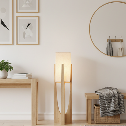 Lampadaire japonais en bois clair dans une entrée scandinave avec miroir rond et console
