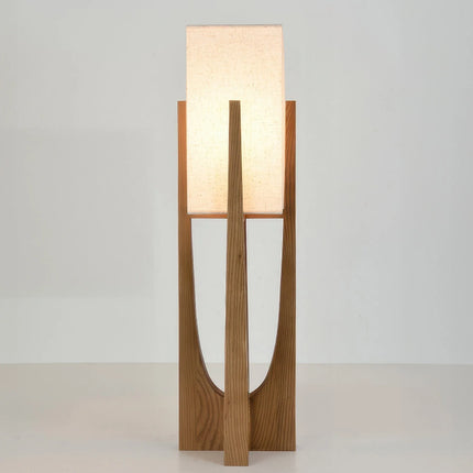 Lampadaire japonais en bois massif clair vu de face, tige laiton doré et abat-jour en lin