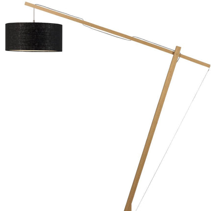 Silhouette complète du lampadaire Montblanc en bambou, bras arqué et abat-jour en lin noir
