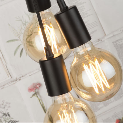 Détail des douilles noires et du filament des ampoules E27 du lampadaire Oslo