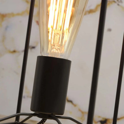 Vue rapprochée du culot noir et de l'ampoule de la lampe à poser Antwerp