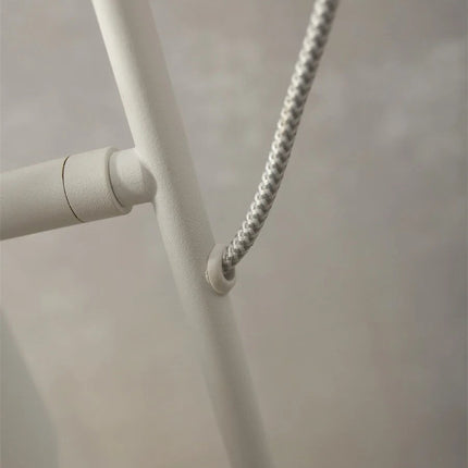 White Lisbon table lamp installed on a countertop