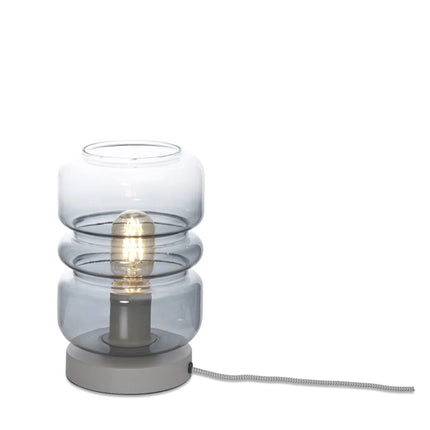 Packshot fond blanc de la lampe à poser Verona en verre fumé gris