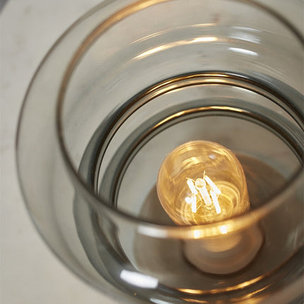 Vue de dessus de la lampe Verona montrant l'ampoule dans le verre fumé