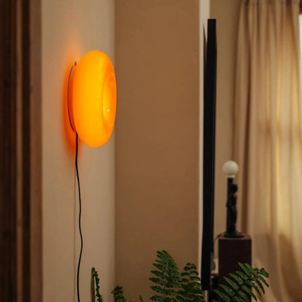 Lampe design donut orange au style rétro iconique