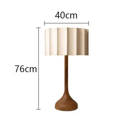 Lampe tactile en bois à ampoule LED et finition soignée pour un salon ou un bureau.