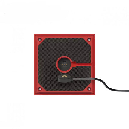 Dessous de la lampe Nutalis rouge avec câble magnétique de charge et grille de haut-parleur