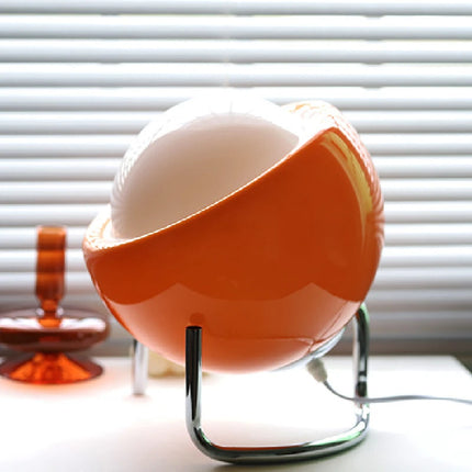 Détail du verre orange à finition plaquée de la lampe circulaire