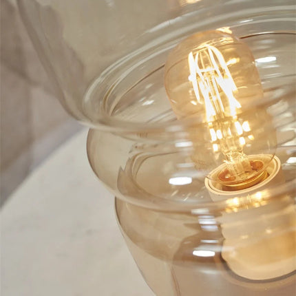 Détail du culot E27 et du verre fumé de la lampe à poser Verona