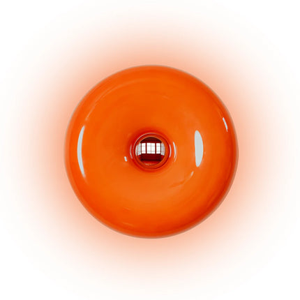 Lampe rétro donut orange allumée diffusant une lumière douce