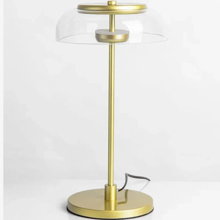 Lampe de table LED verre moderne posée sur un bureau nordique