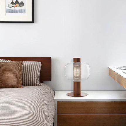 Lampe de table moderne en verre design nordique allumée diffusant une lumière douce