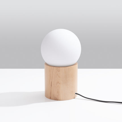 Lampe à poser Pure Bois Naturel vue de profil, mettant en valeur le veinage du bois clair