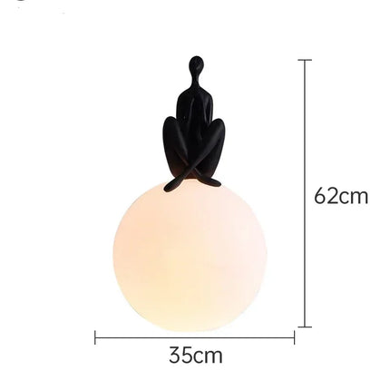 Lampe de table sculpture humanoïde LED dans une chambre design