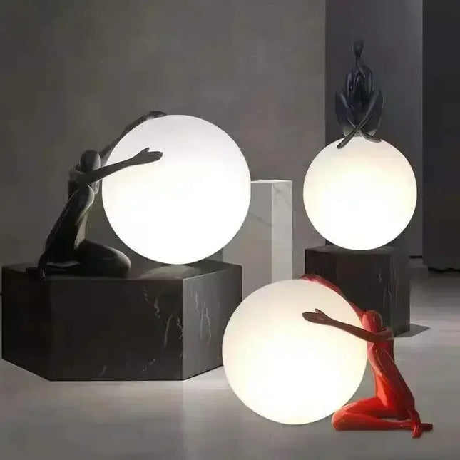 Lampe de table sculpture humanoïde LED au design artistique en résine