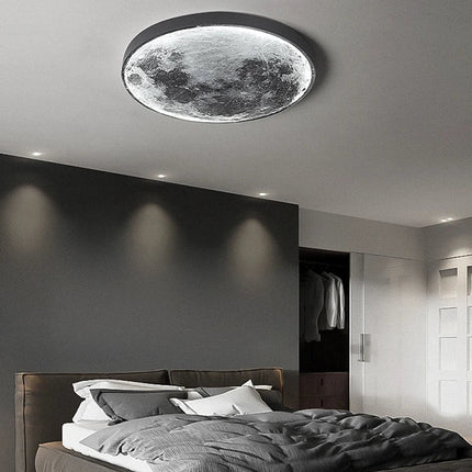 Luminaire lune LED à effet cratères monté au plafond d'une chambre