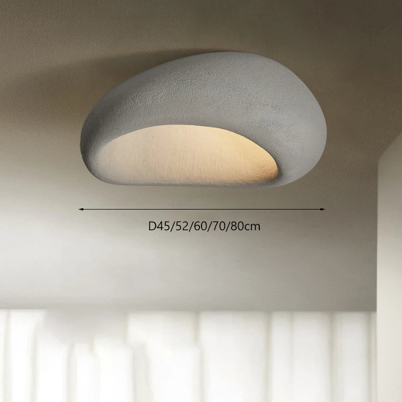 Luminaire de plafond japonais en résine avec éclairage LED, parfait pour un intérieur épuré et moderne.