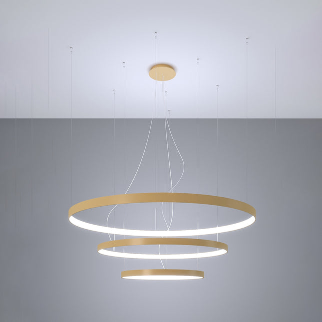 Lustre Anneau Solis 3 anneaux dorés allumé, halos concentriques