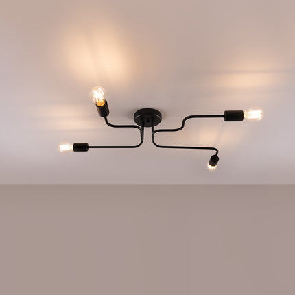 Lustre Design Flex 4 bras noir allumé sur fond beige