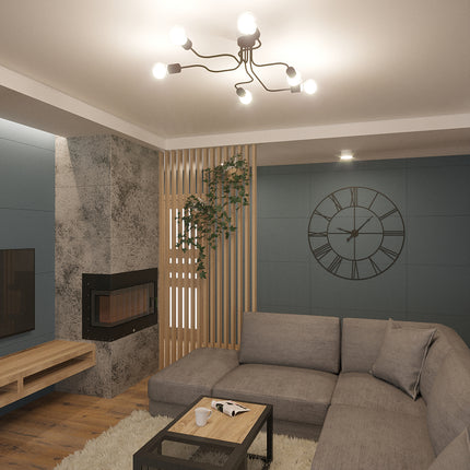 Lustre Design Flex 6 bras allumé au plafond d'un salon contemporain le soir