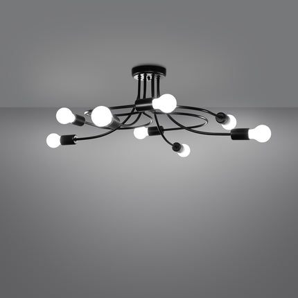 Lustre Twist Moderne 8 bras noir allumé sur fond gris foncé