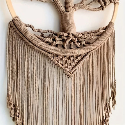 Détail des franges nouées à la main du macramé arbre de vie marron