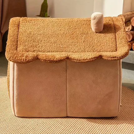 Chat au repos dans sa maison pliable et douillette