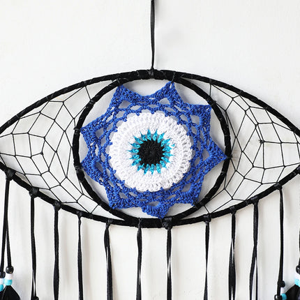 Œil bleu en macramé, osier et corde de coton de style bohème