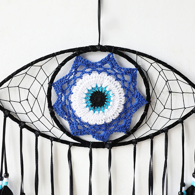 Œil bleu en macramé, osier et corde de coton de style bohème