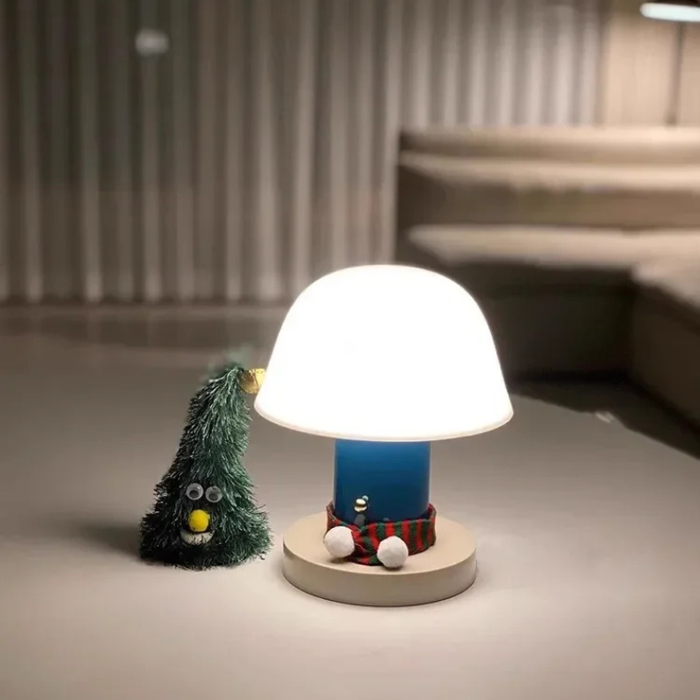 Petite lampe tactile LED danoise bleu avec éclairage blanc chaud et design moderne, idéale pour la chambre.