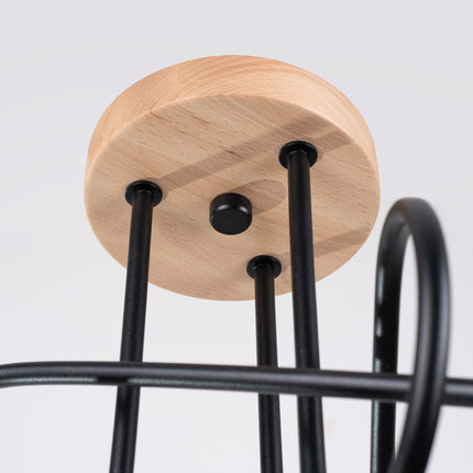 plafonnier 3 bras bouclés en bois et métal noir, détail de la fixation