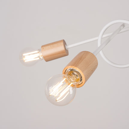 plafonnier 5 bras bouclés en bois et métal blanc, mécanisme de montage