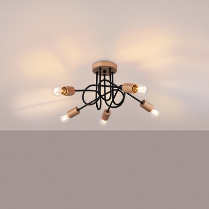 plafonnier 5 bras bouclés en bois et métal noir, lumière allumée