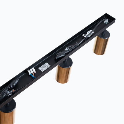 Détail des spots dorés du Plafonnier Acier Luxe 4 Barre, gros plan