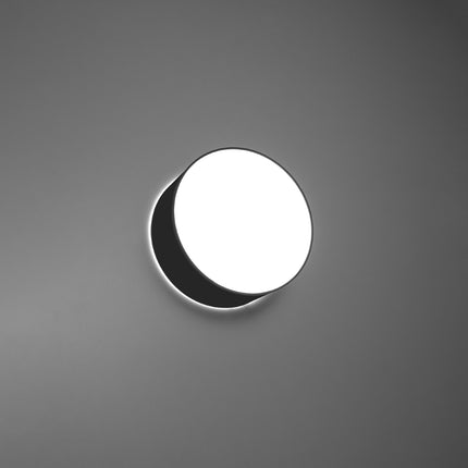 Plafonnier Arène 25 noir diffusant une lumière douce