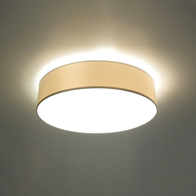 Plafonnier Arène blanc allumé, lumière chaude douce diffusée vers le bas et vers le plafond