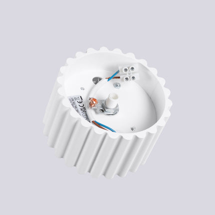 Matte white Aura 1 ceiling light, top view showing the circular fluting