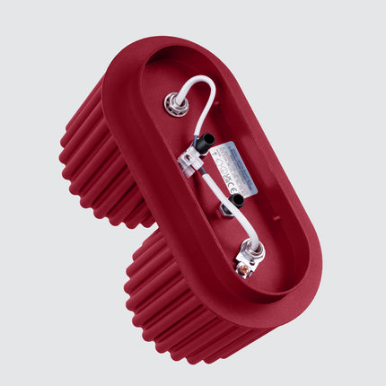 Vue arrière du plafonnier Aura bordeaux montrant la platine de fixation et le bornier de raccordement