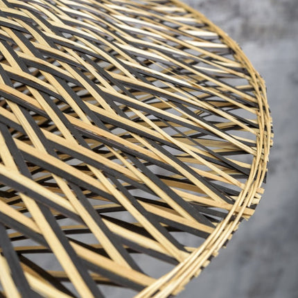 Detail of the handcrafted black and natural bamboo weave on the edge of the Bali ceiling light